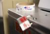 ‘I Voted’ stickers on top of a ballot box.