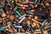 Alkaline batteries are separated and dumped into a bin at the North Seattle Hazardous Waste site, where people can drop off