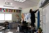 Caitlin Tumlinson, a teacher at Lakeside High School in the Nine Mile Falls School District near Spokane, prepares her