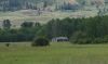 About a mile outside of Nespelem, Washington sits an old, abandoned cabin surrounded by tall grass in the Nespelem Valley on