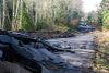 Sekiu, WA, March 2, 2009 -- Along The Straight of Juan De Fuca, State Route 112 suffered severe damage after flooding