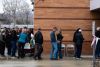 Idaho Republicans line up for the 2024 presidential caucus at Whittier Elementary in Boise.