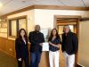 Members of the Community Economic Coalition, including Hispanic Metropolitan Chamber Executive Director Nicole Davison León,
