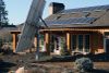 Rooftop solar panels at Naches Heights vineyard in Yakima, Wash.