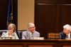 Idaho Rep. Bruce Skaug, R-Nampa, (center) listens to debate during a House State Affairs committee meeting at the State