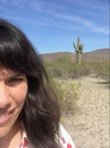 Reporter Rebecca Clarren stands by a saguaro cactus at the Gila River Indian Community,
    just outside of Pheonix, Arizona.