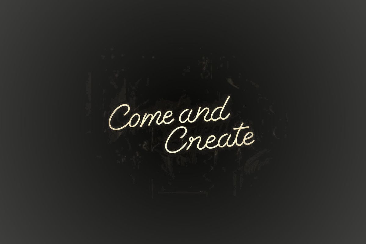 come and create text on black background 