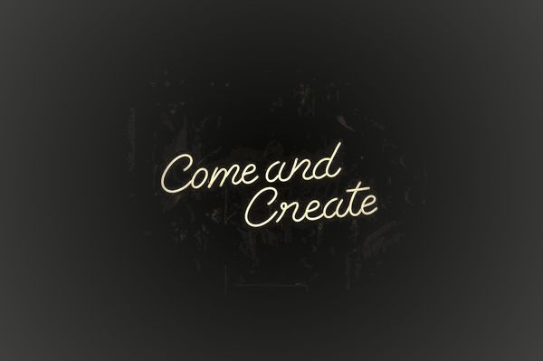 come and create text on black background 