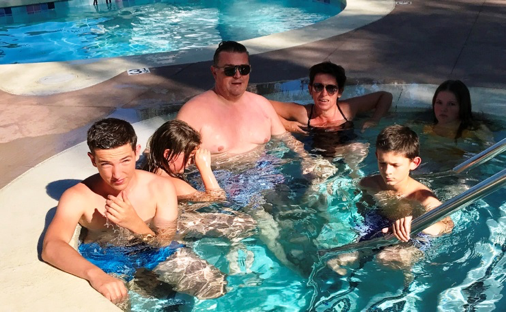 Home exchange family in the tub