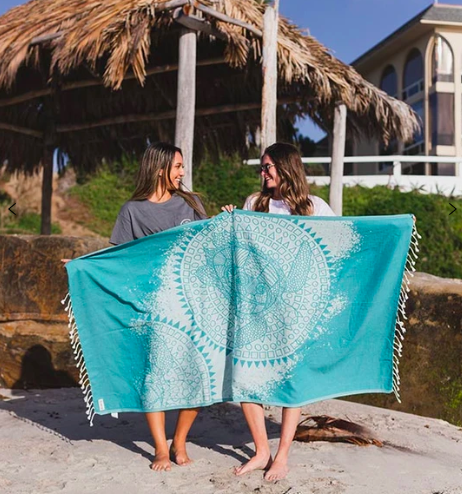 Sand Cloud beach towel- HomeExchange beach essentials
