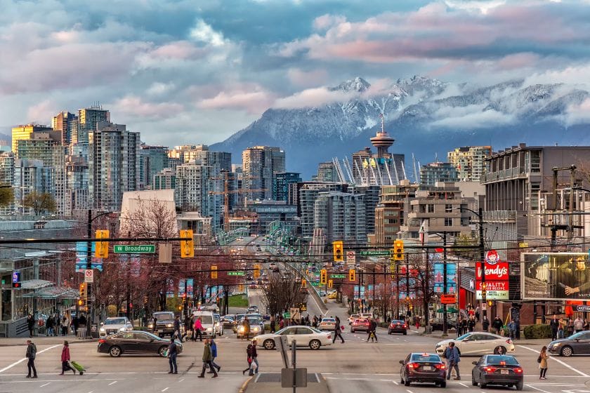 The view of the snow-caped mountains from downtown Vancouver