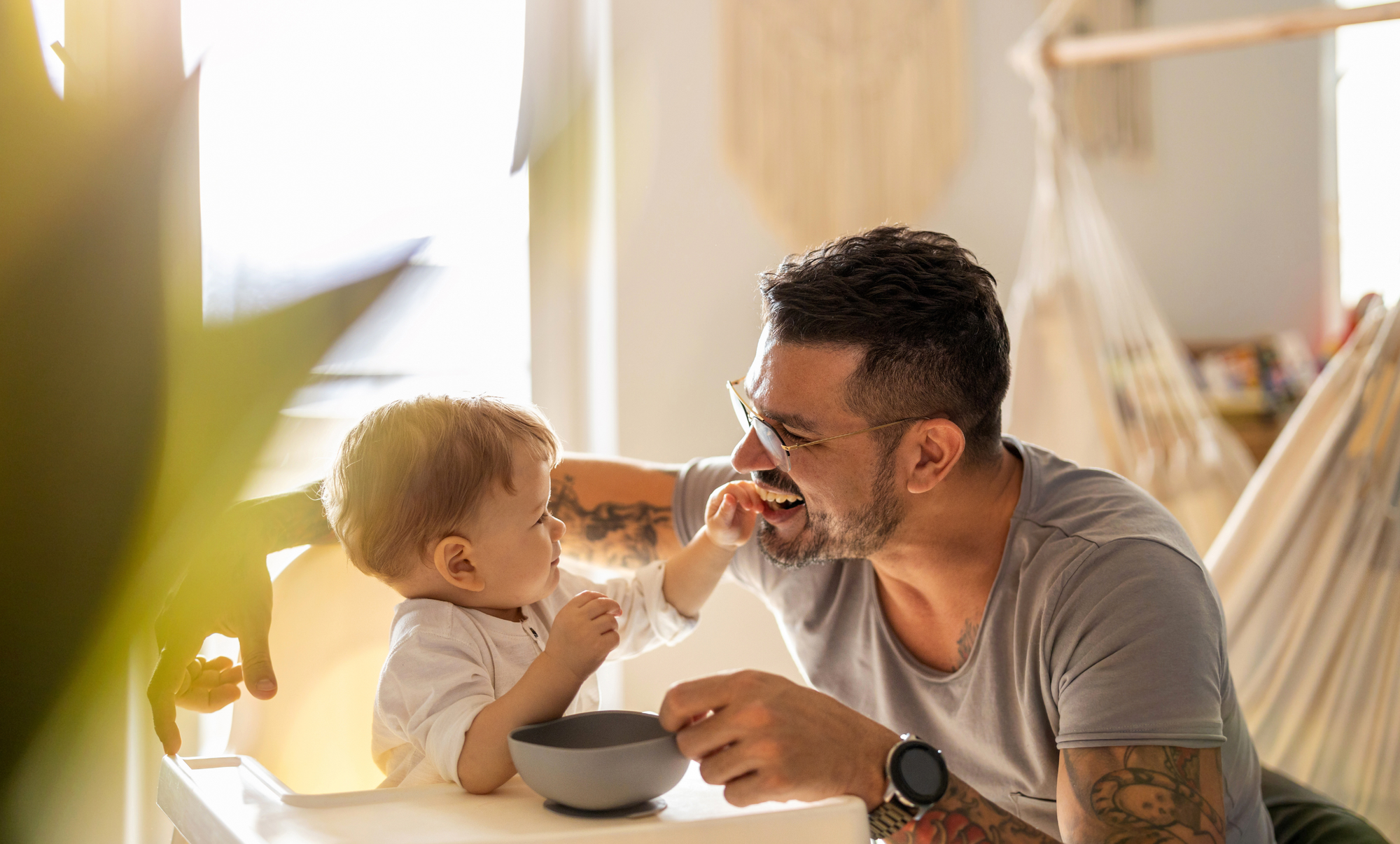 Father and son enjoying a meal