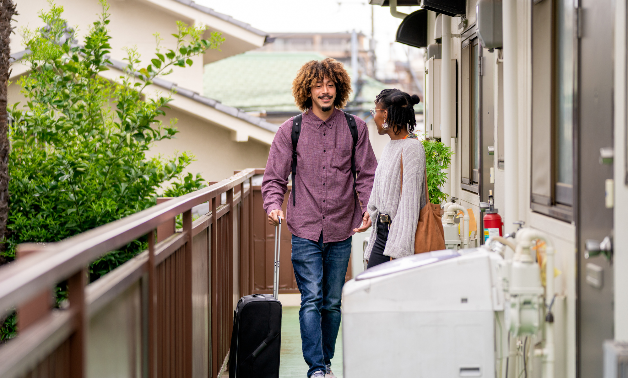 Travelers arriving at their HomeExchange