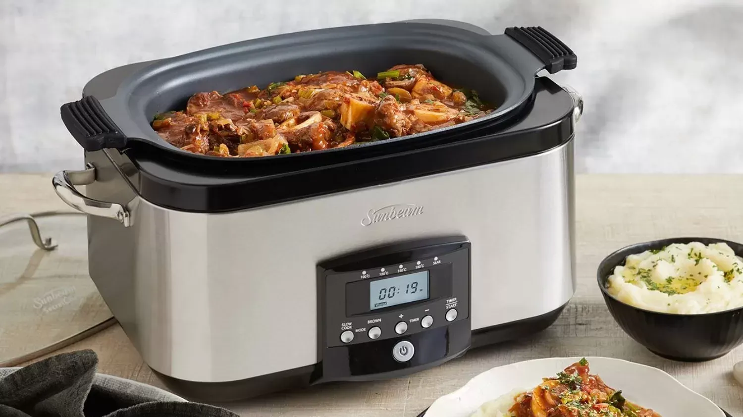 A sunbeam slow cooker cookinga. stew