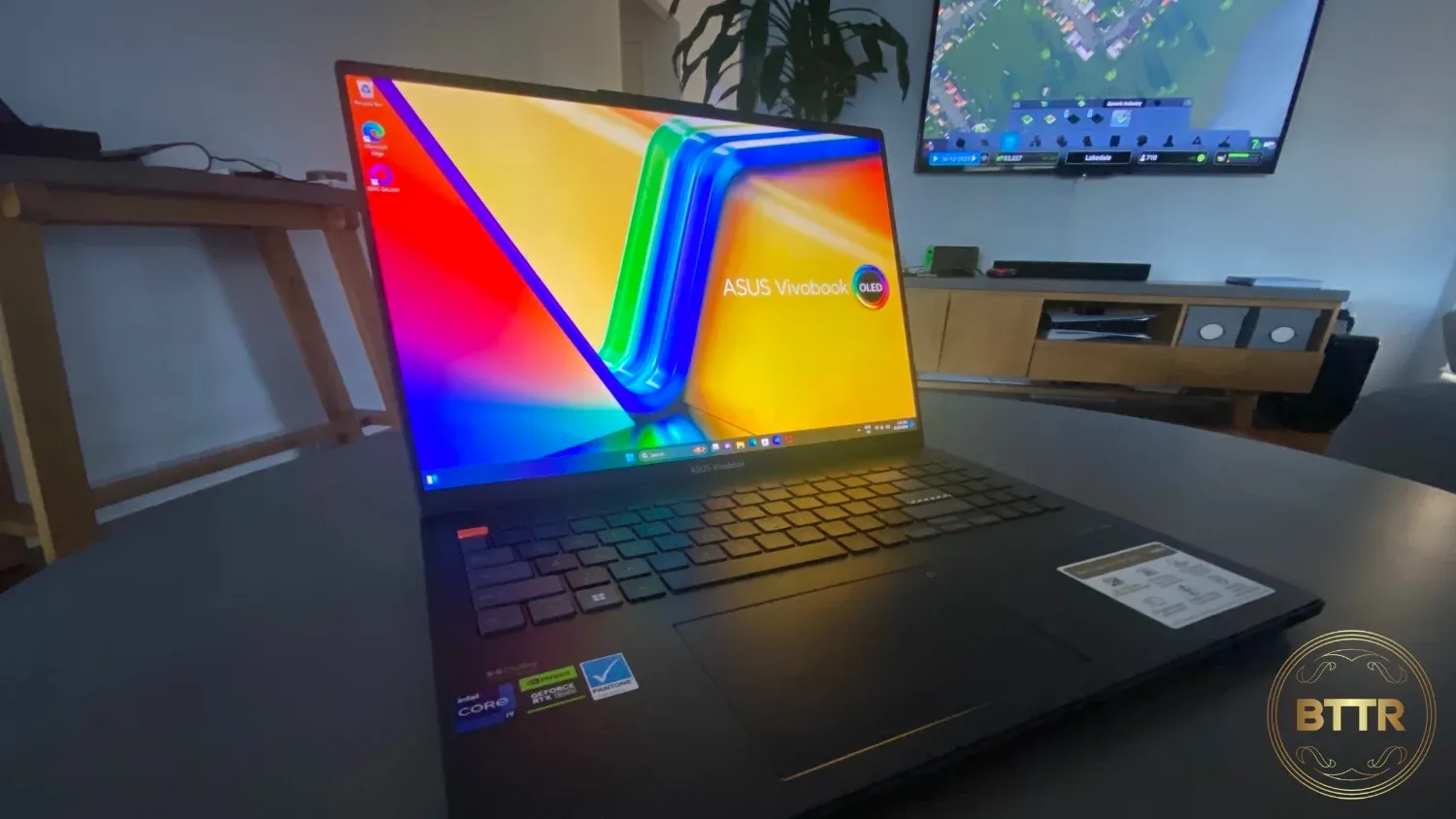 Looking at the Vivobook Pro 16X OLED on a coffee table