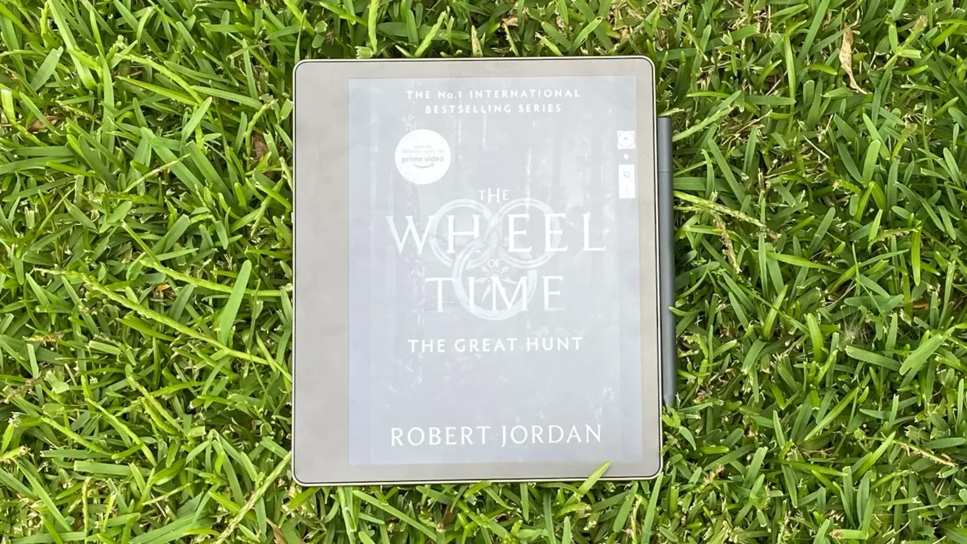 The Scribe in the grass with its pen magnetically attached to the side.