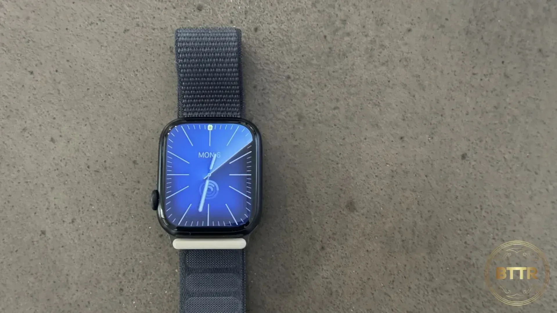 Apple Watch Series 9 on a concrete table