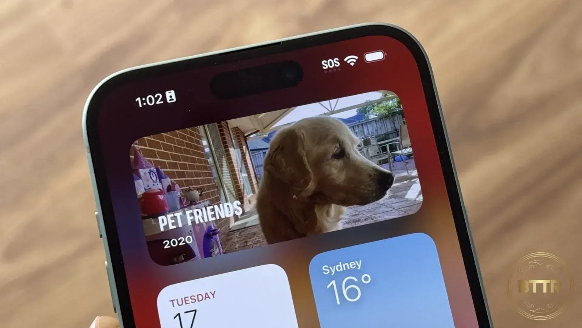 Looking at widgets on the iPhone 15  Plus screen