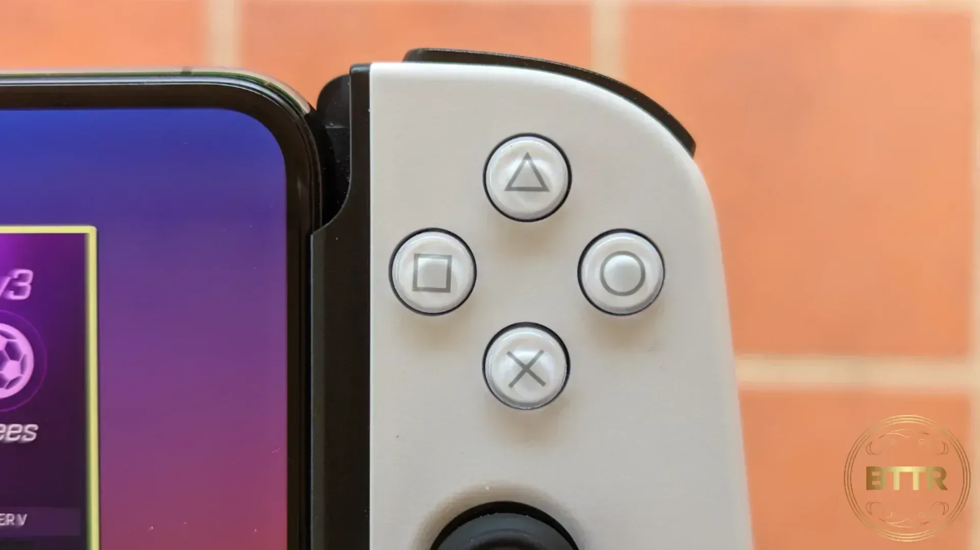 Closeup of the BackBone One's playstation buttons