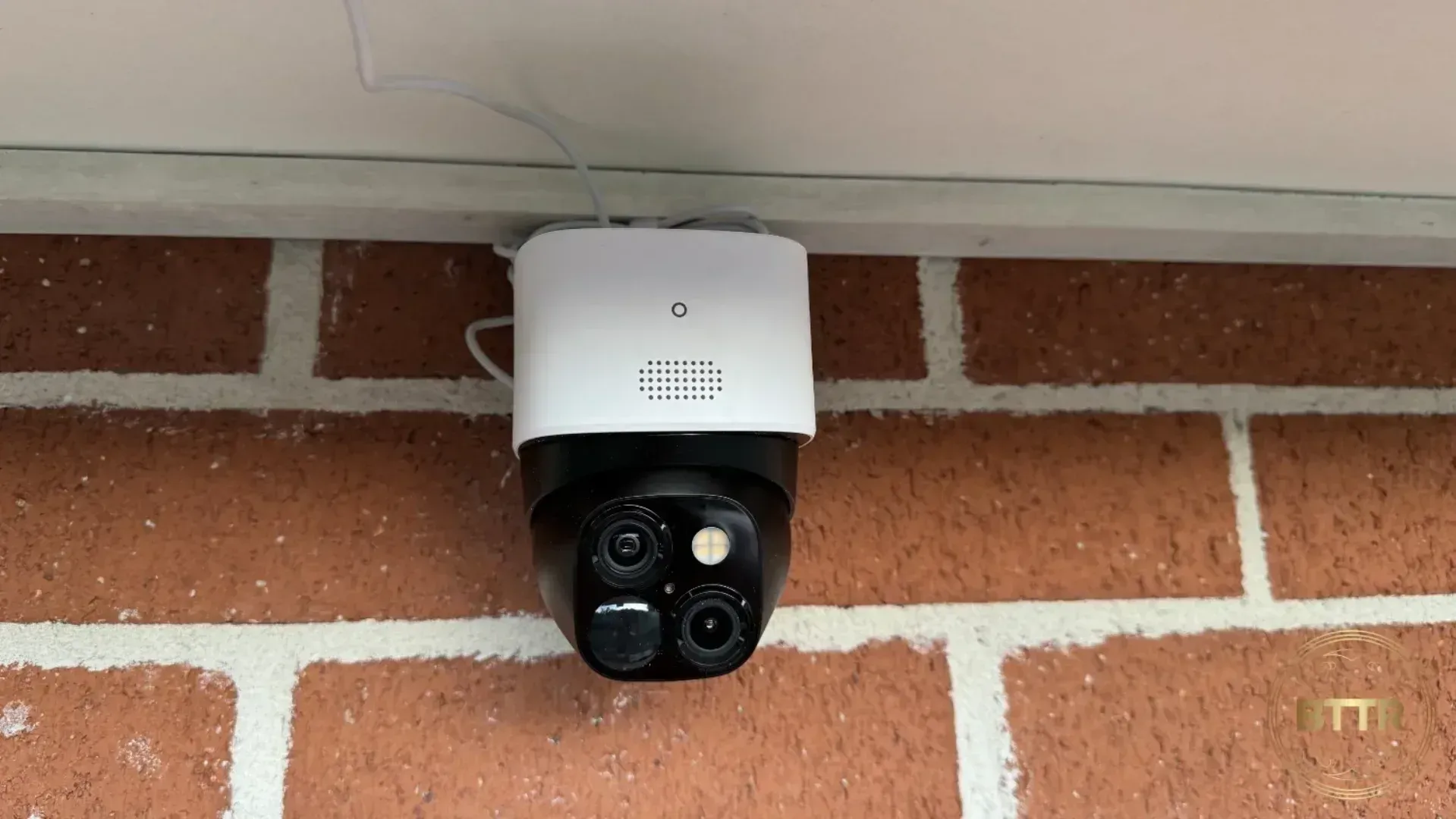 Eufy S340 solocam mounted on a brick wall