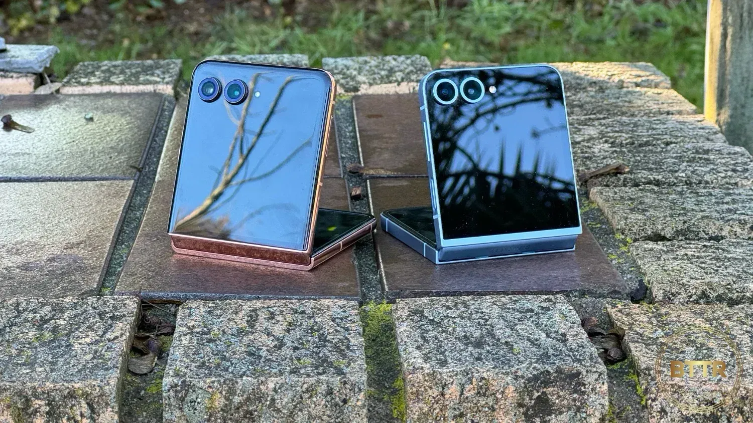 Side by side looking at the external displays on the two flip phones