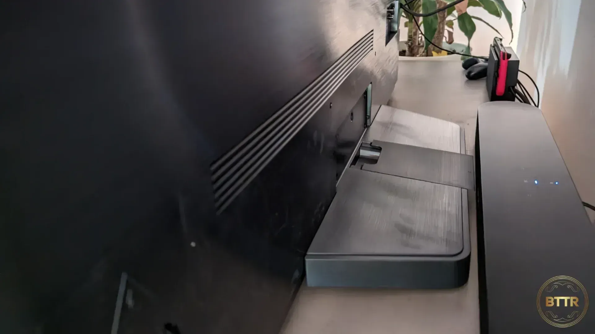 The base of the CS OLED takes up a lot of space, and is super low, making it difficult to use with a soundbar