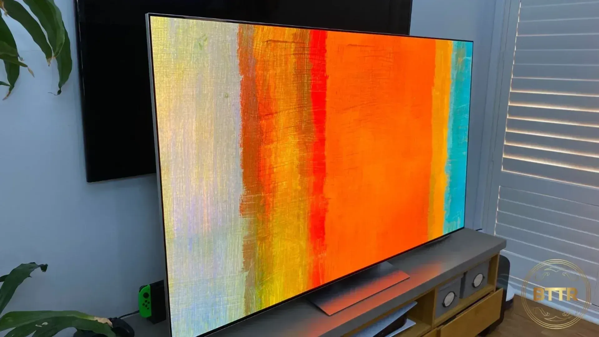The LG G3 set up on an entertainment unit