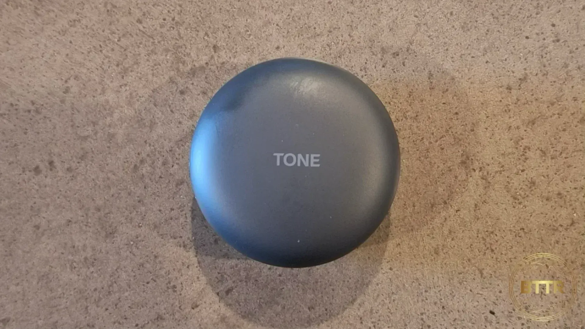 Looking straight down on the case of the T90 earbuds