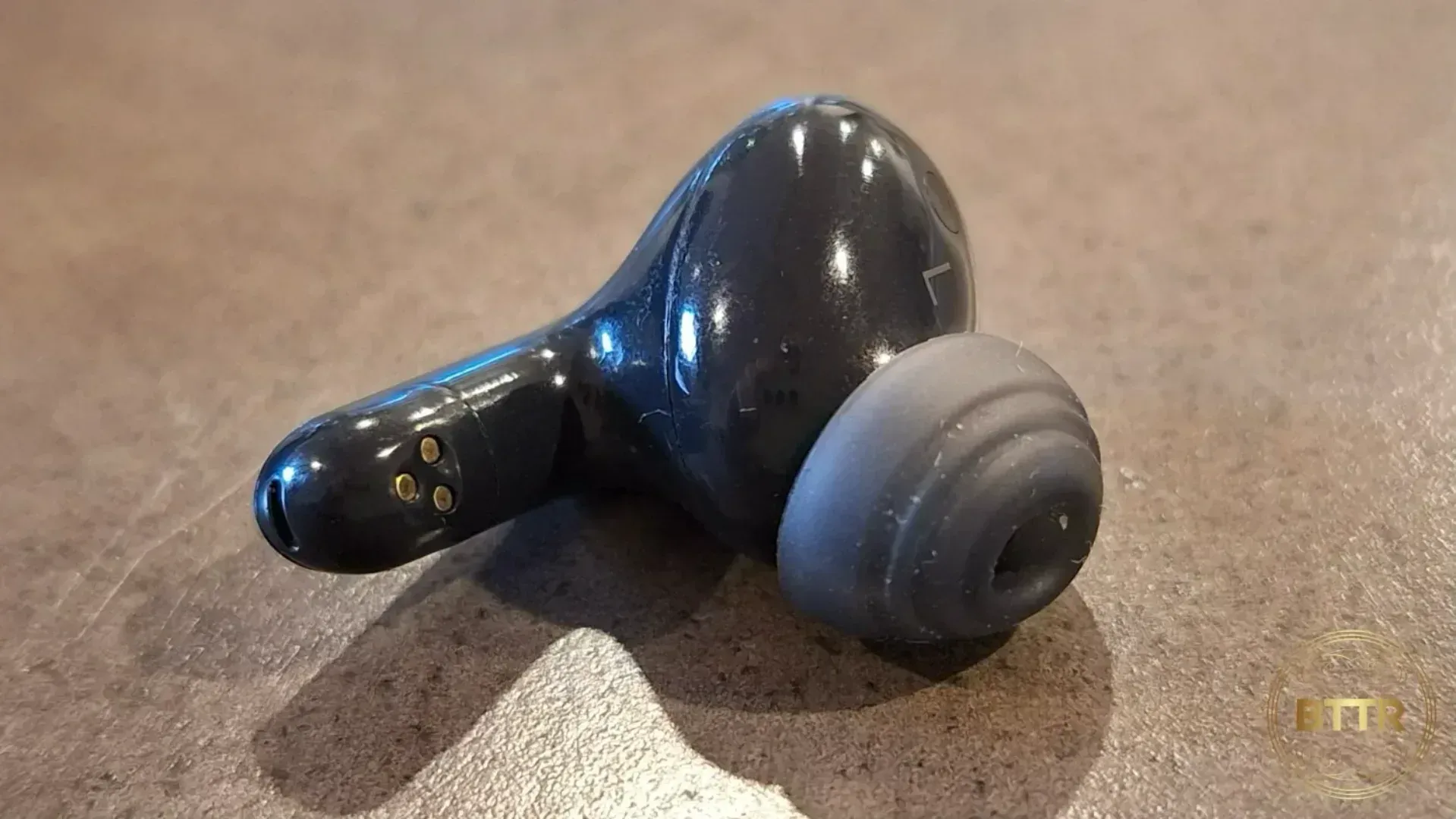 Close up of the left T90 earbud.