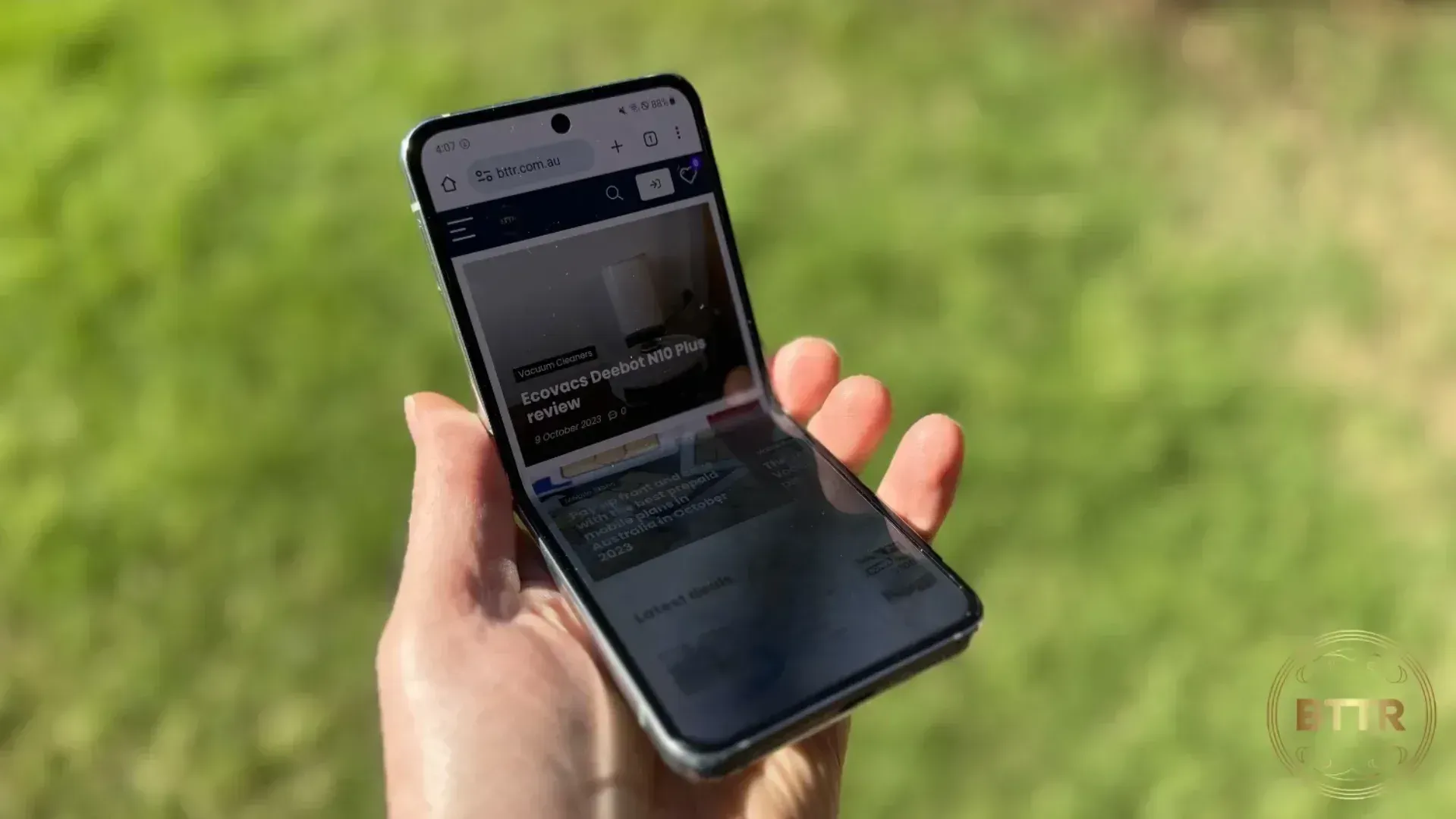 The Z Flip 5 half folded in a hand