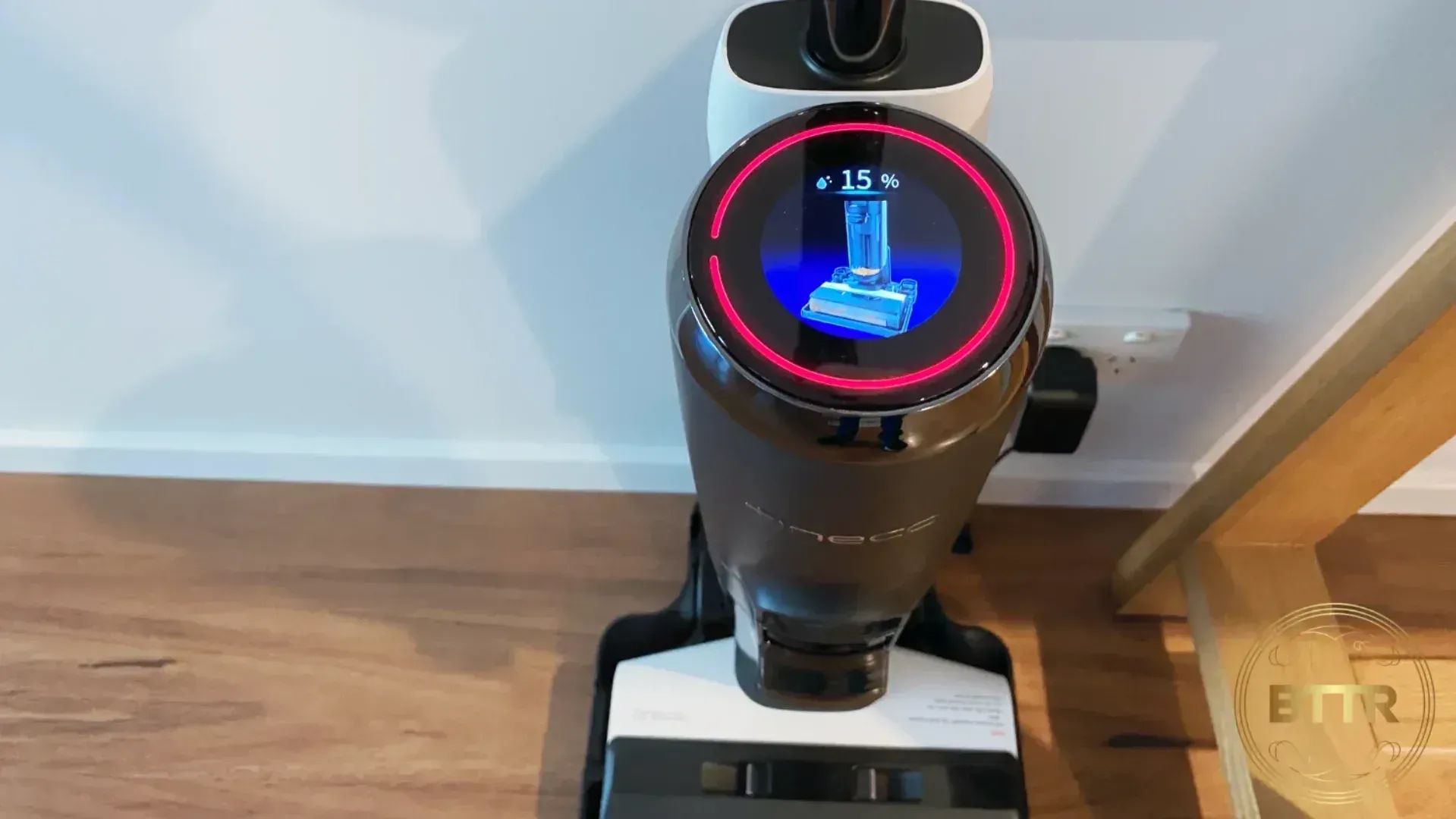 The Tineco Floor One S5 Pro on its charger during the self clean cycle