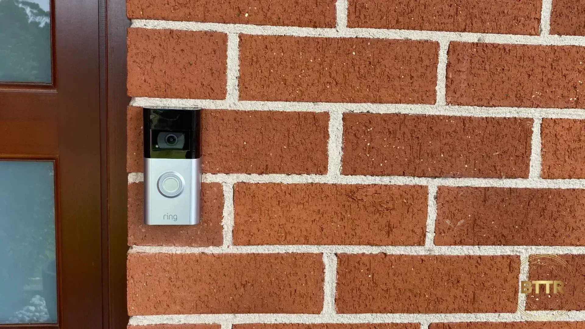 The Ring Video Doorbell 4 on a brinck wall