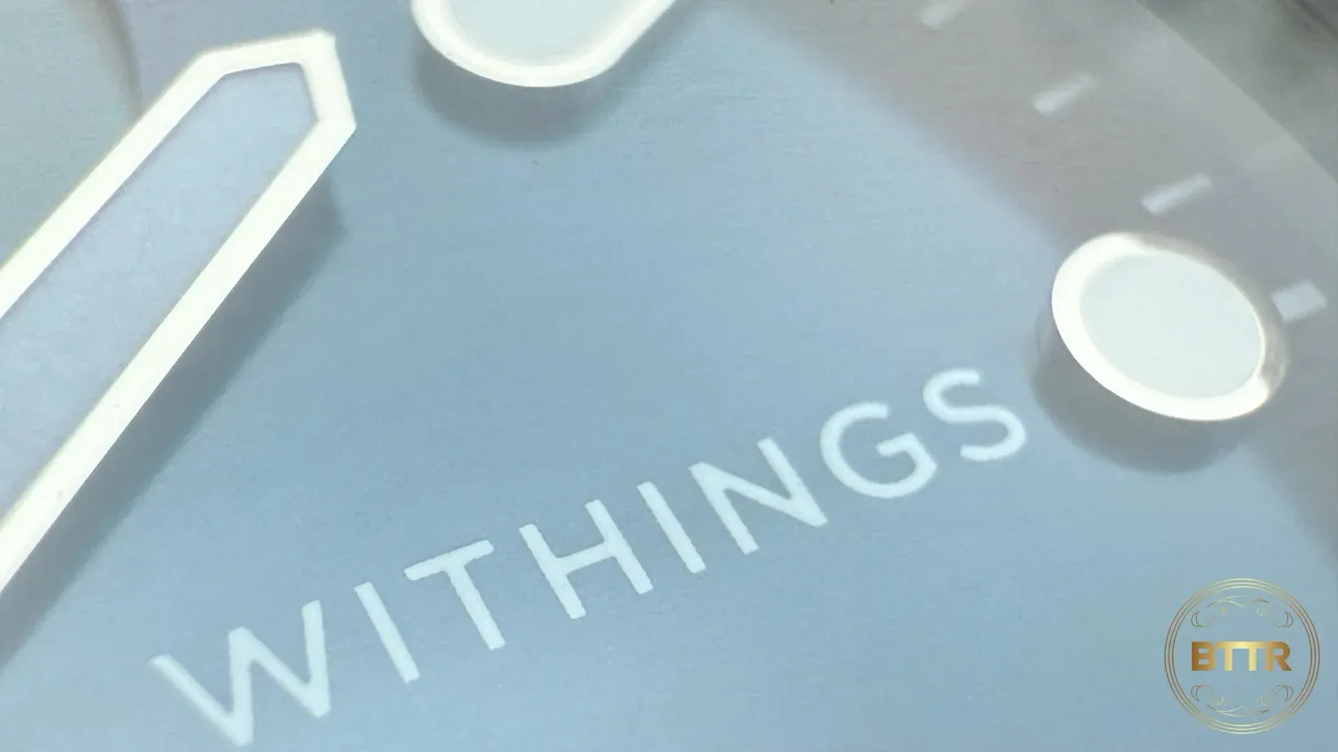Closeup of the Withings Logo and minute hand on the Nova