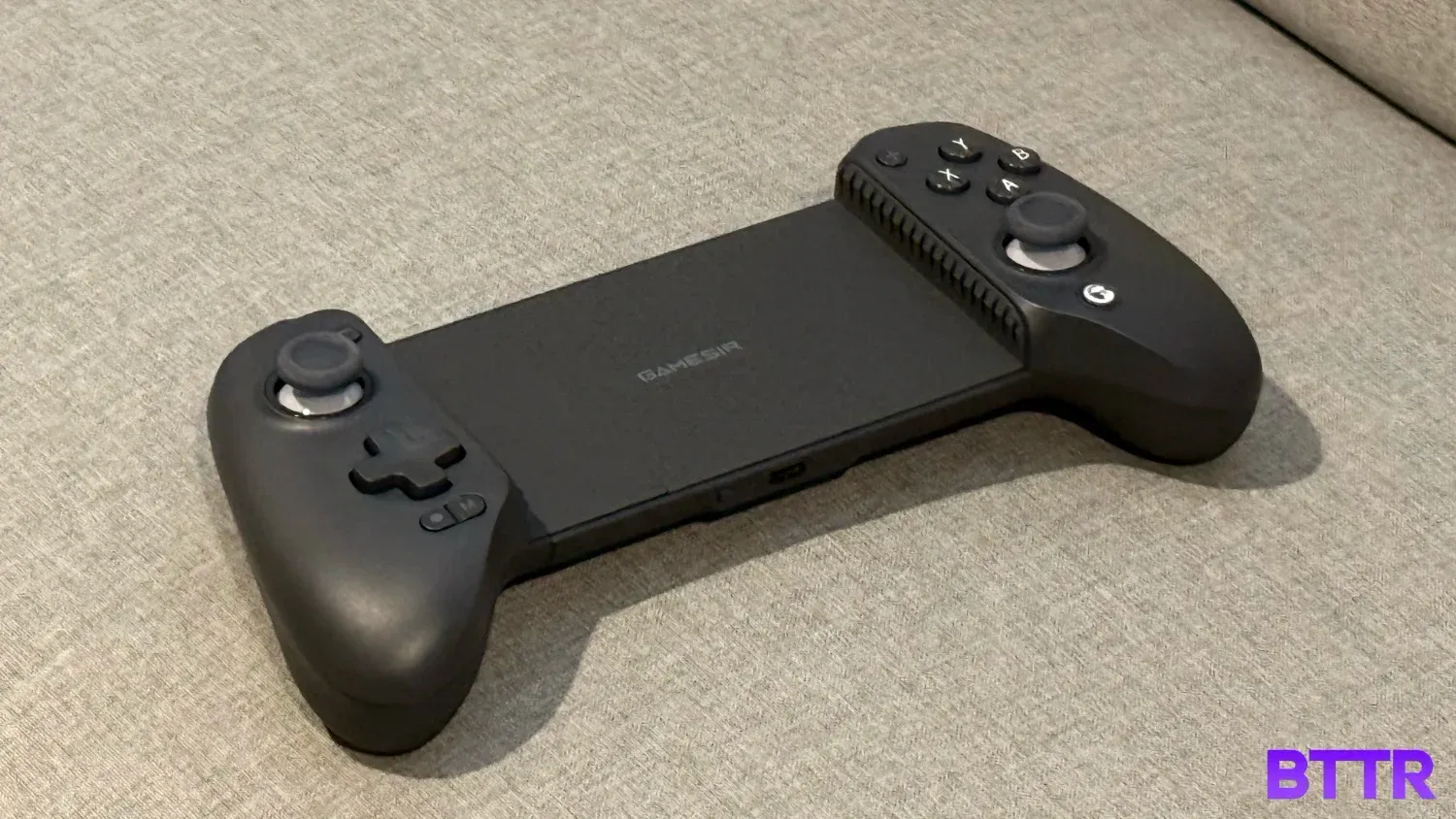 The GameSir G8 Plus on a lounge