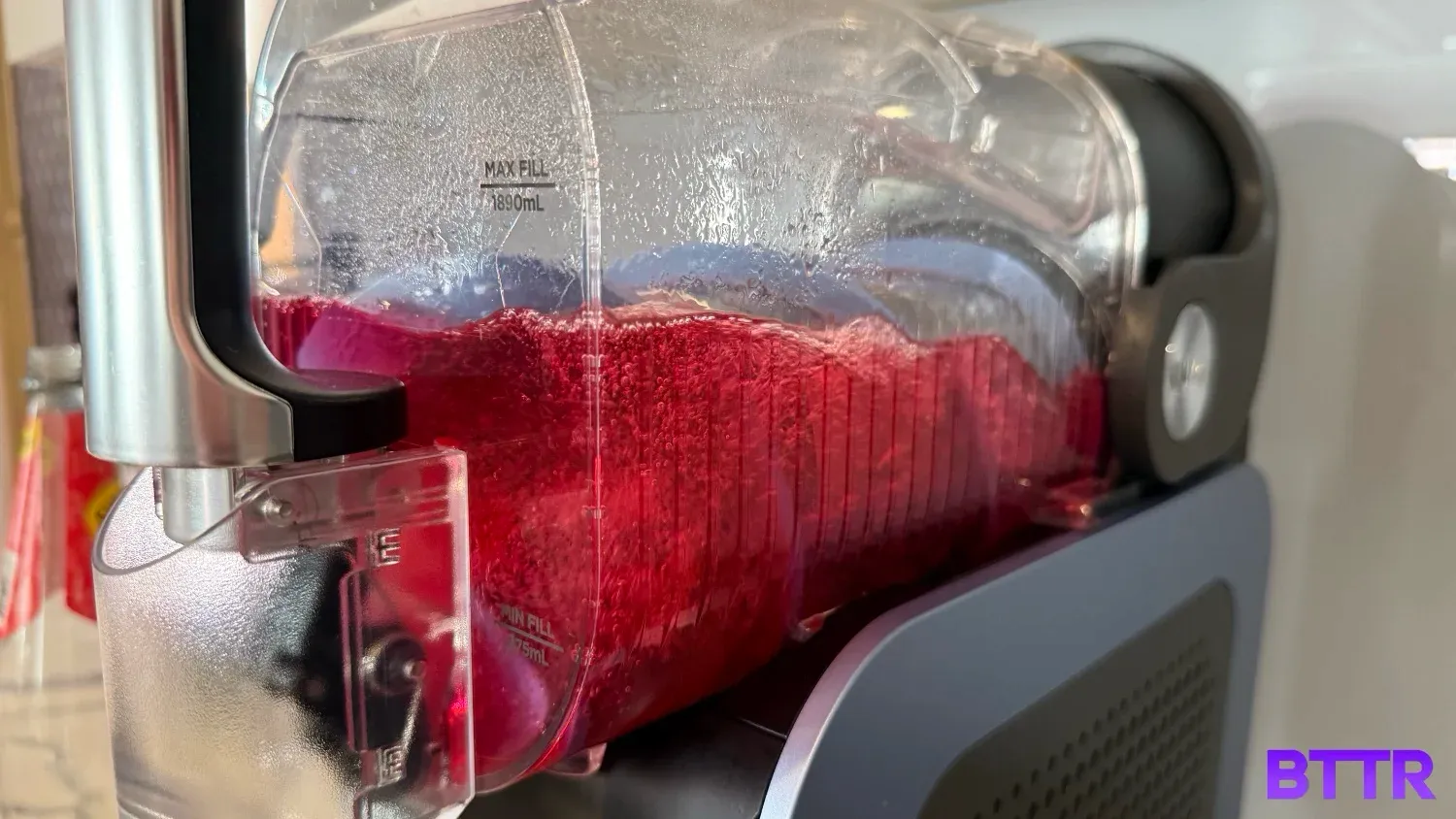 The Slushi turning raspberry drink into sluch