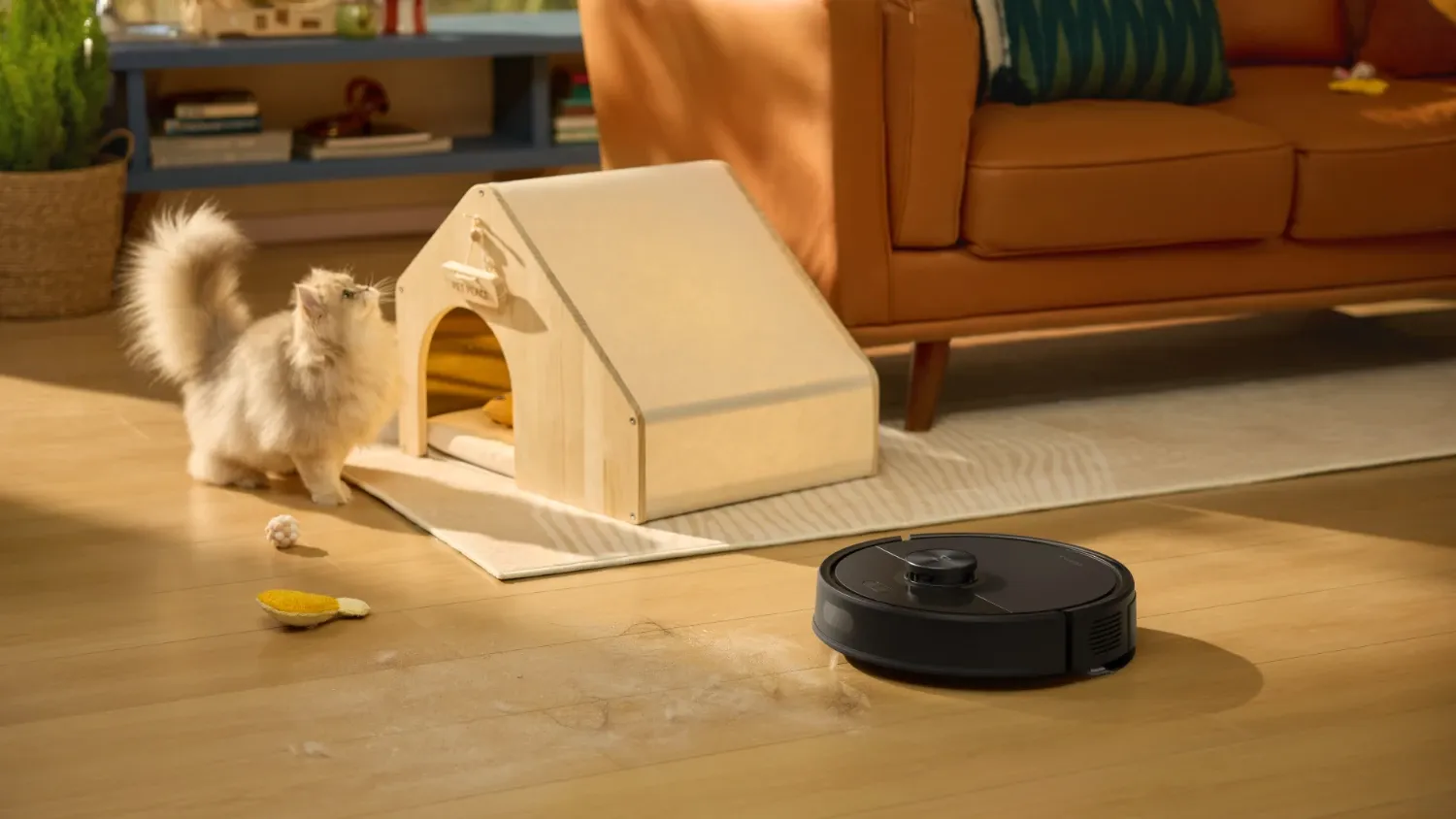 The new Q7T+ robot vacuum from roborock cleaning near a cat
