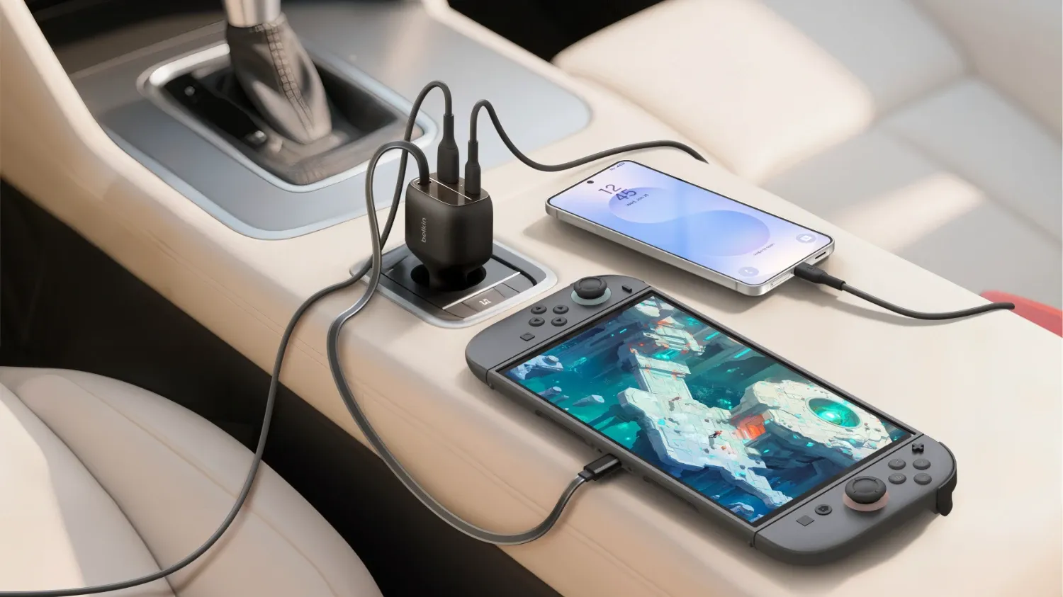The retractable car charger plugged into a phone and a Switch in a car