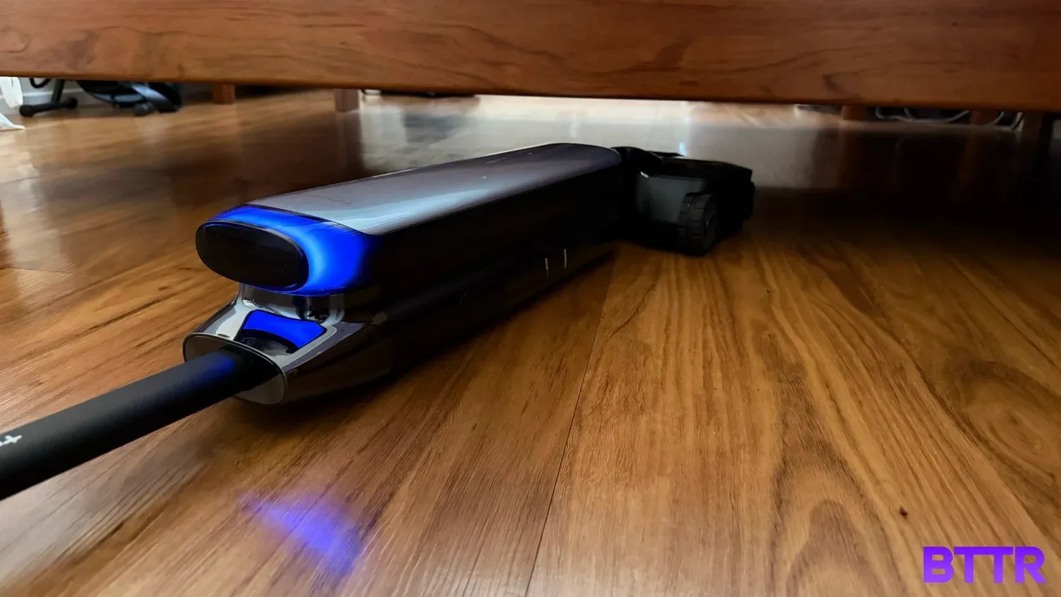 The Tineco Floor One S9 Artist Pro laying flat to clean under my bed