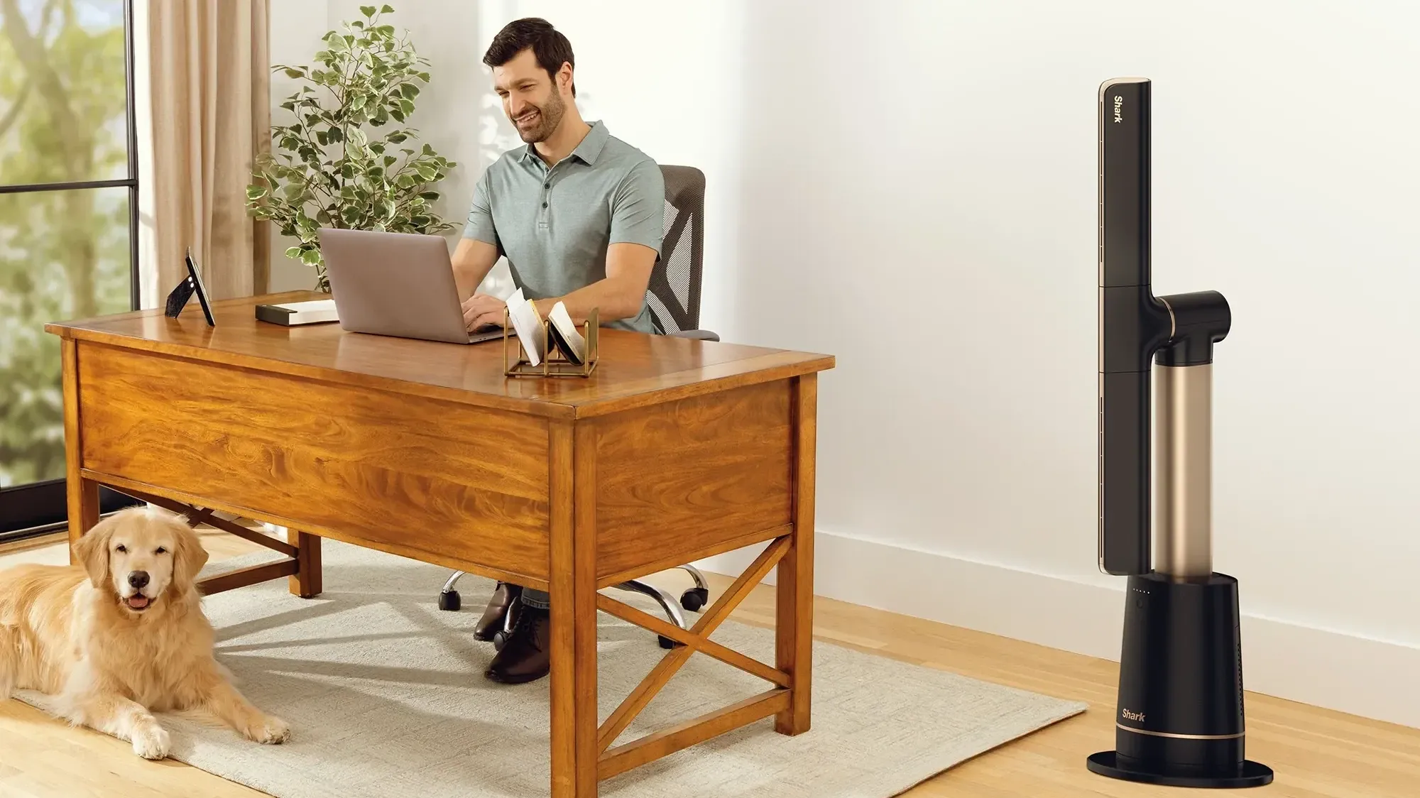 A man working near the Shark TurboBlade fan