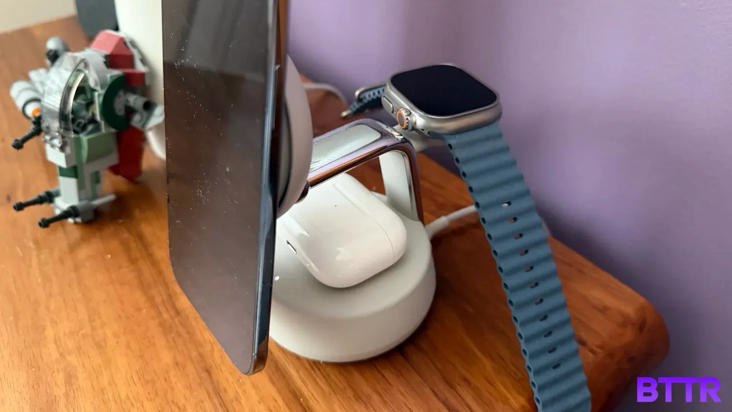 he Belkin UltraCharge Pro 3-in-1 25W Qi2 charger charghing an iPhone Air, AirPods Pro and Apple Watch Ultra