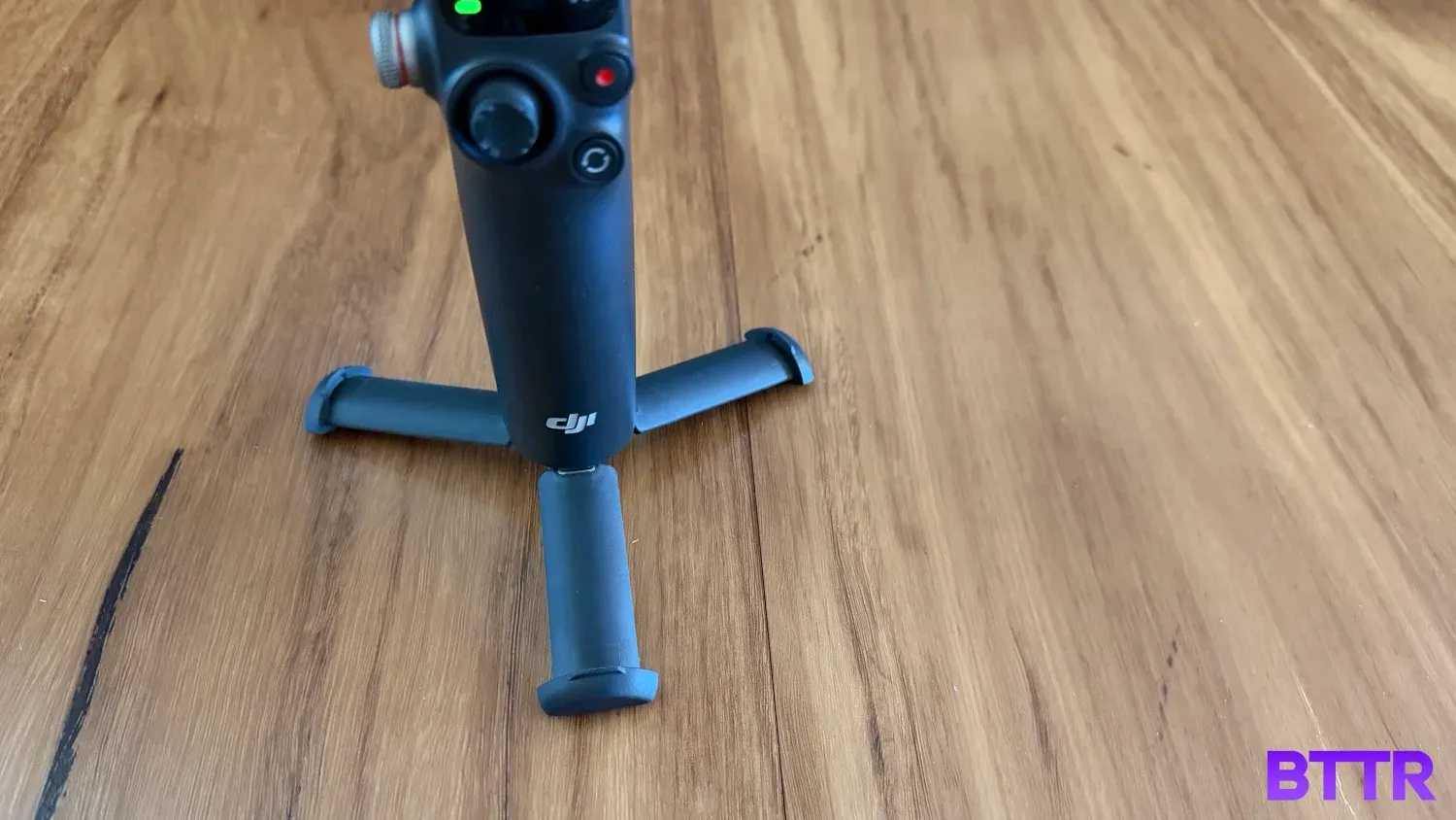 The built-in tripod of he DJI Osmo Mobile 8