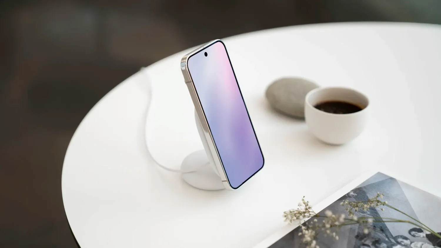 Google's Pixelsnap charger with stand on a coffee table