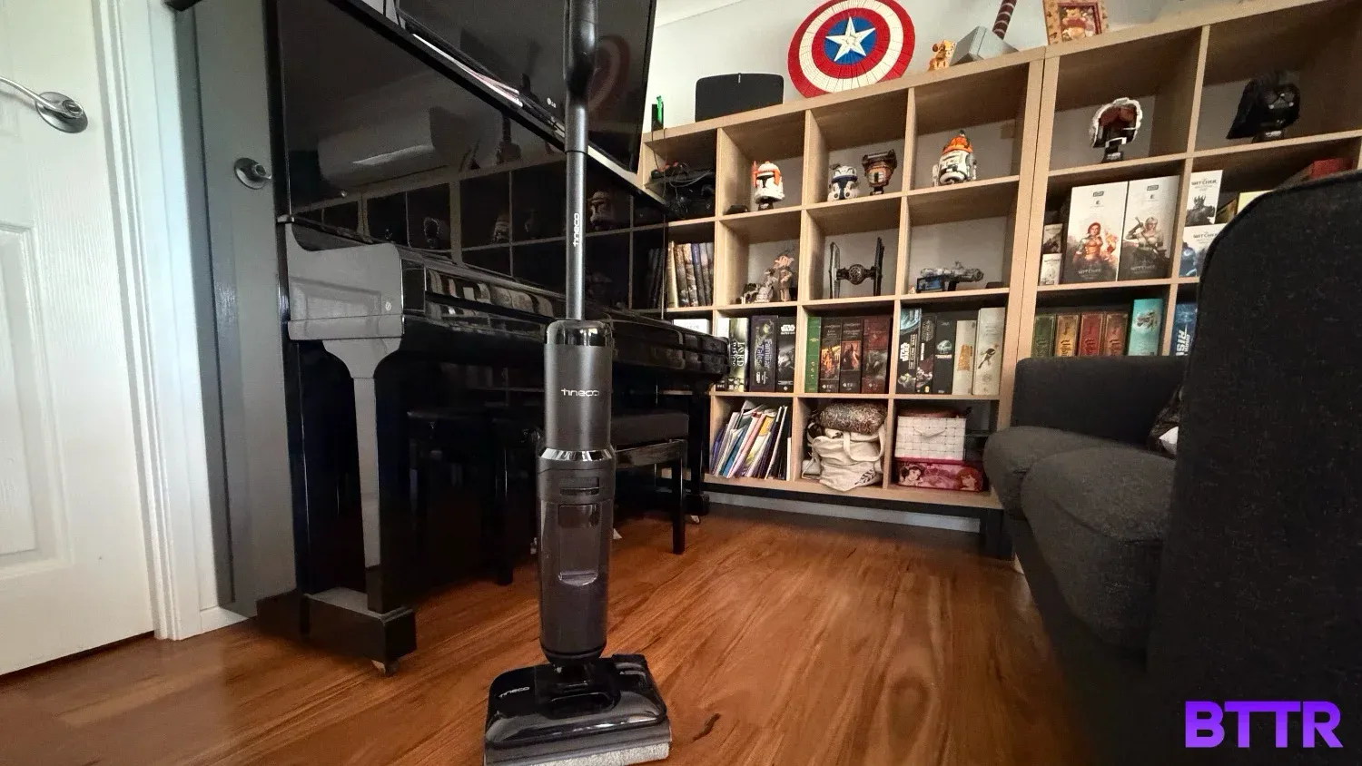 The S7 Stretch in front of a piano and bookshelf