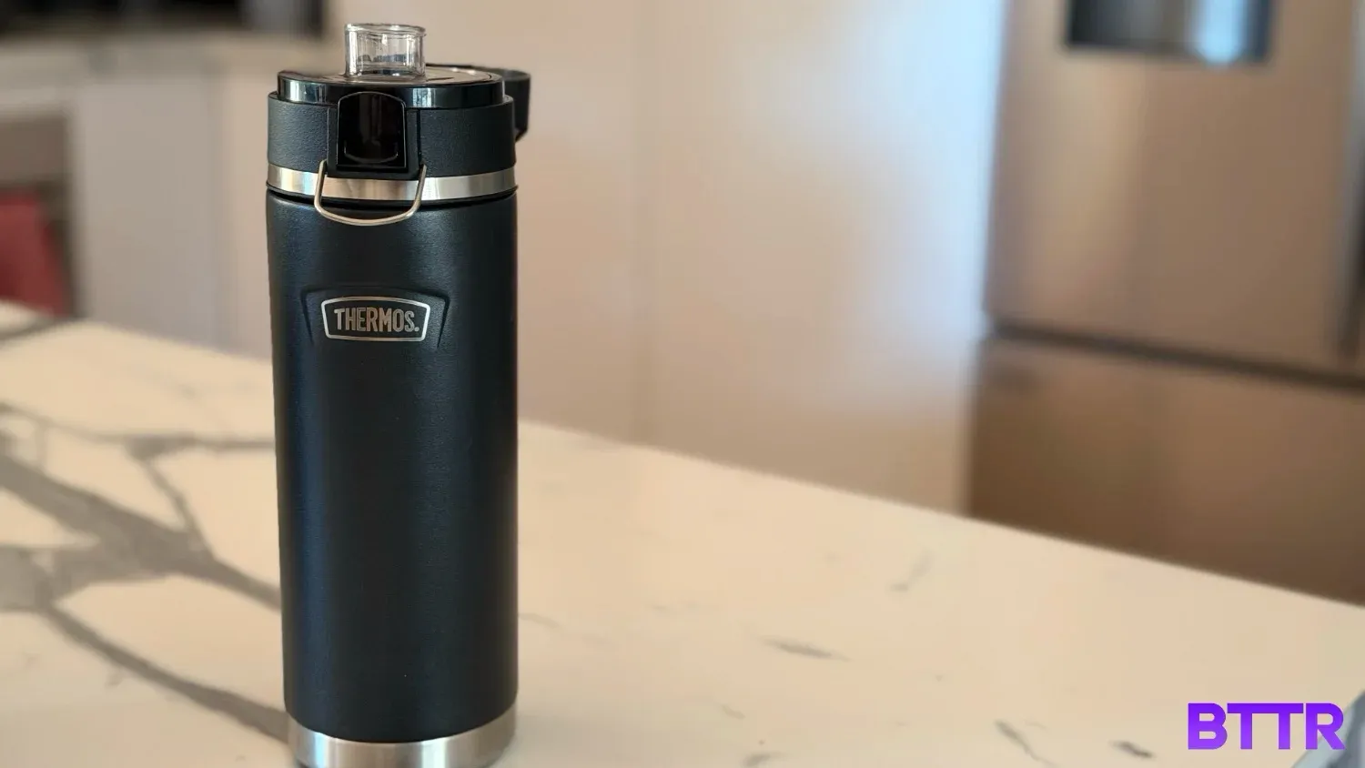 The Icon series water bottle on a bench