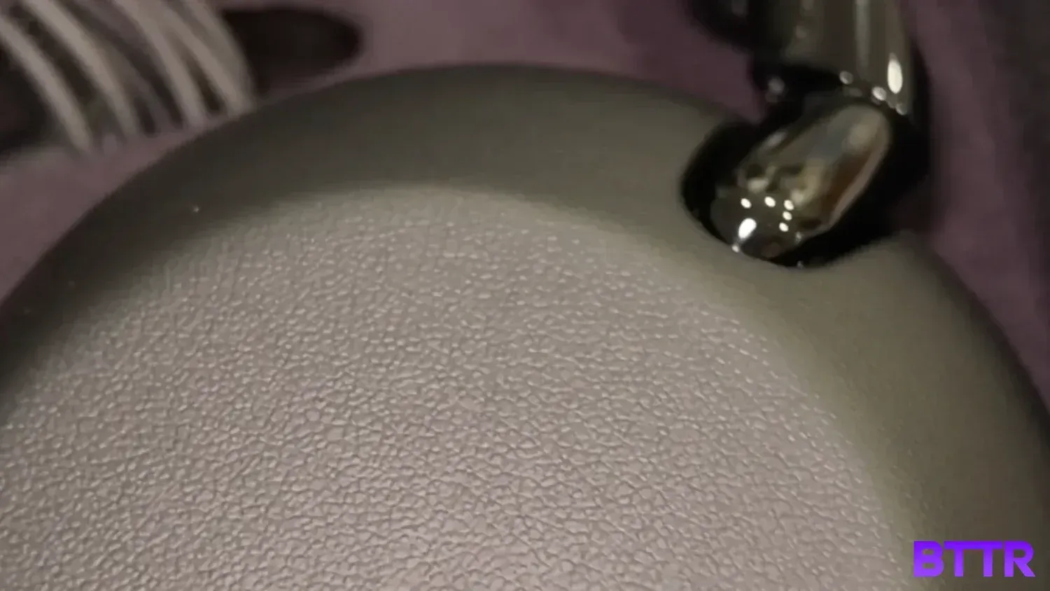 A close up look at the faux leather finish of the COLLEXION headphones
