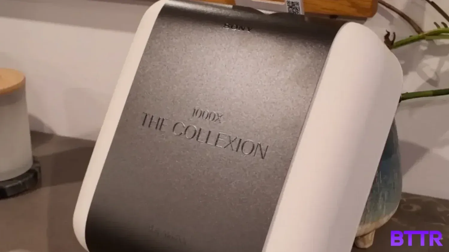 The WH-1000X THE COLLEXION headphones in the recyclable packaging.