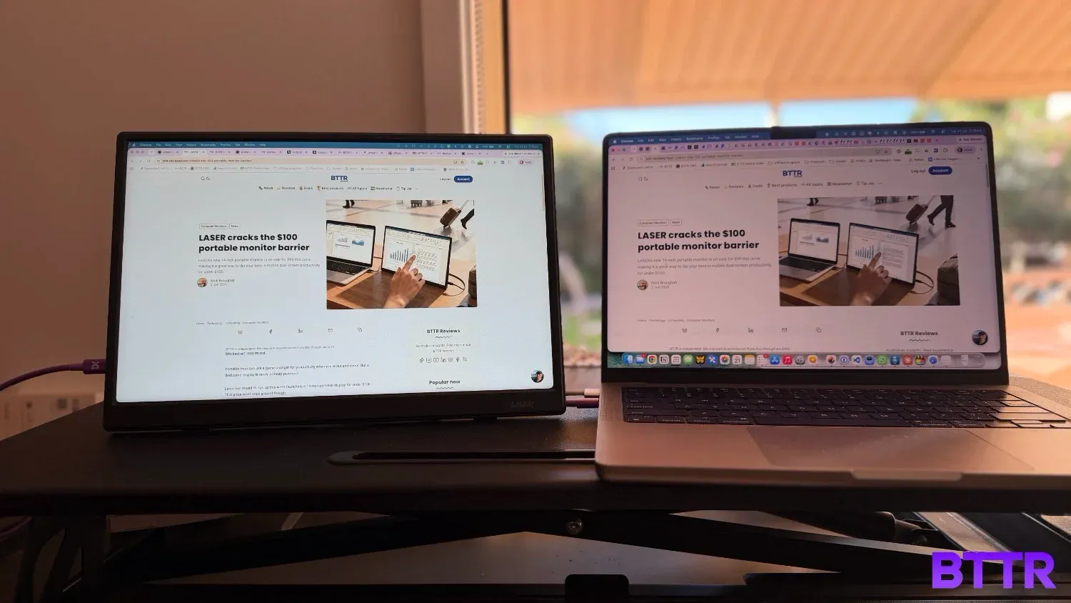 The Laser portable monitor next to a 14 inch Macbook Pro.