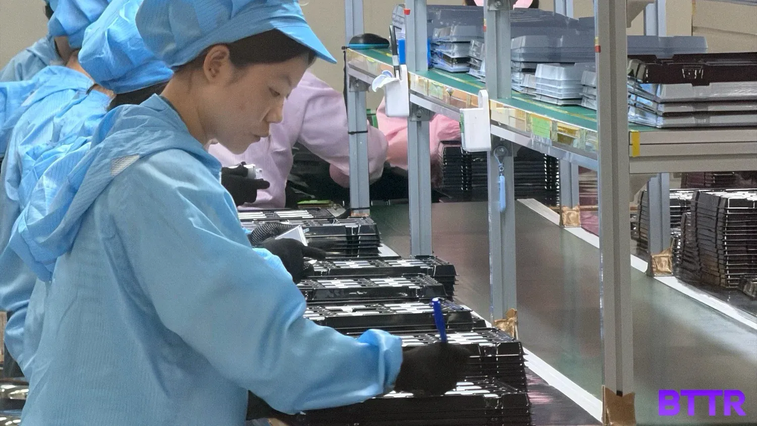 A worker sorting the batteries