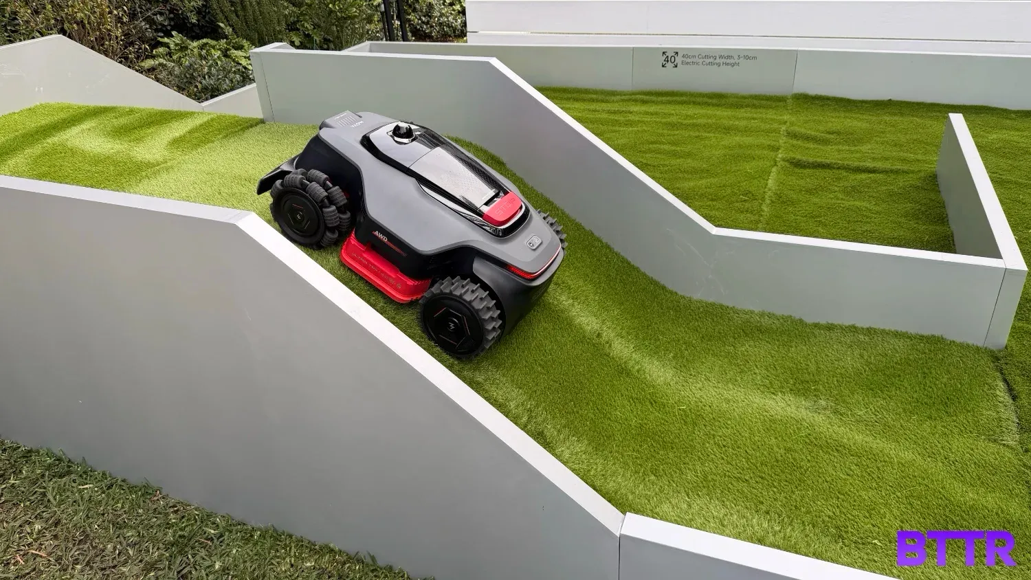MOVA's robot lawnmower climbing a steep incline