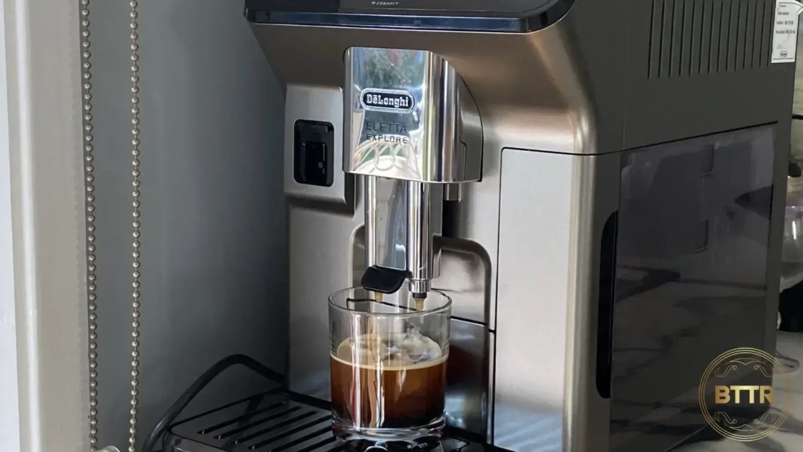The De'Longhi Eletta Explore making me a cold brew. I miss this machine so much.